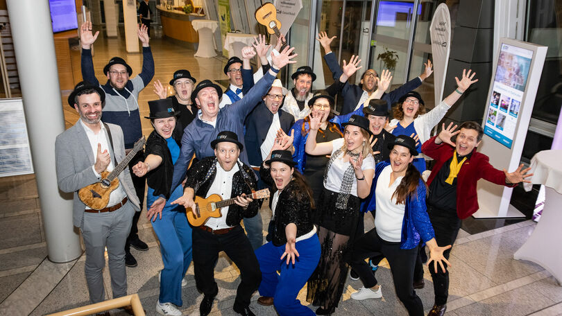 Die Disy-Firmenband AC/Disy posiert gemeinsam beim Disy Werkstattgespräch 2026.